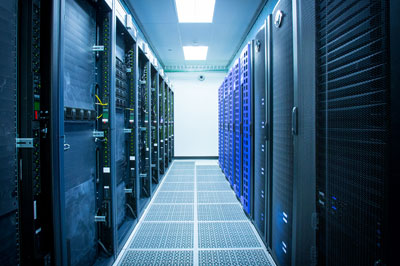 A server room with several rows of server racks